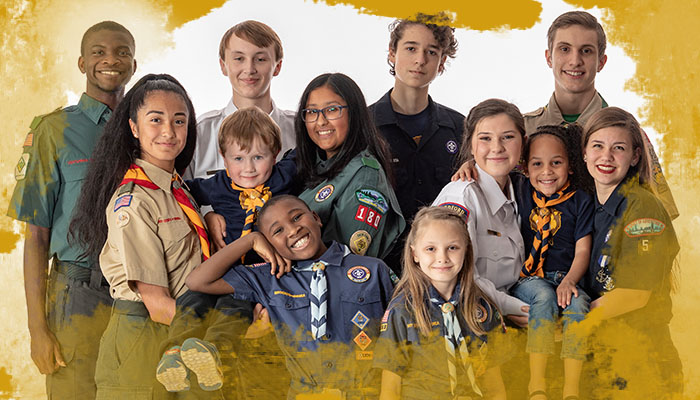 A group of Scouts in various uniforms